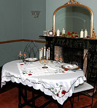 Valentines Day table with Double Love Knot glassware, Ruby Rose table linen and Hearty photoframe and tealight holders on mantlepiece